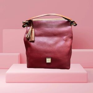 Dooney & Bourke Red and Brown Shoulder Bag with Structured Shape and Tassel